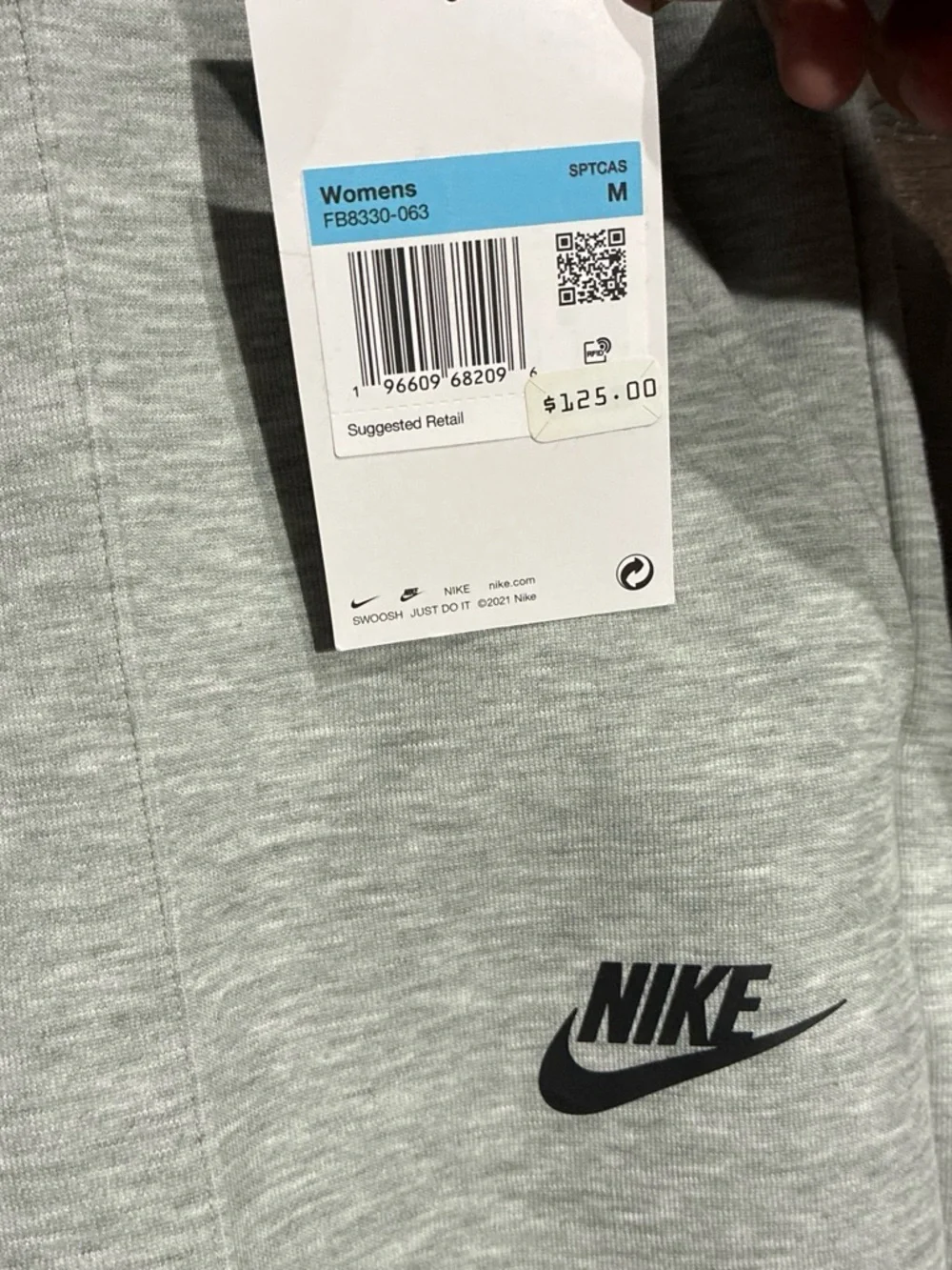 Women’s grey nike tech pants